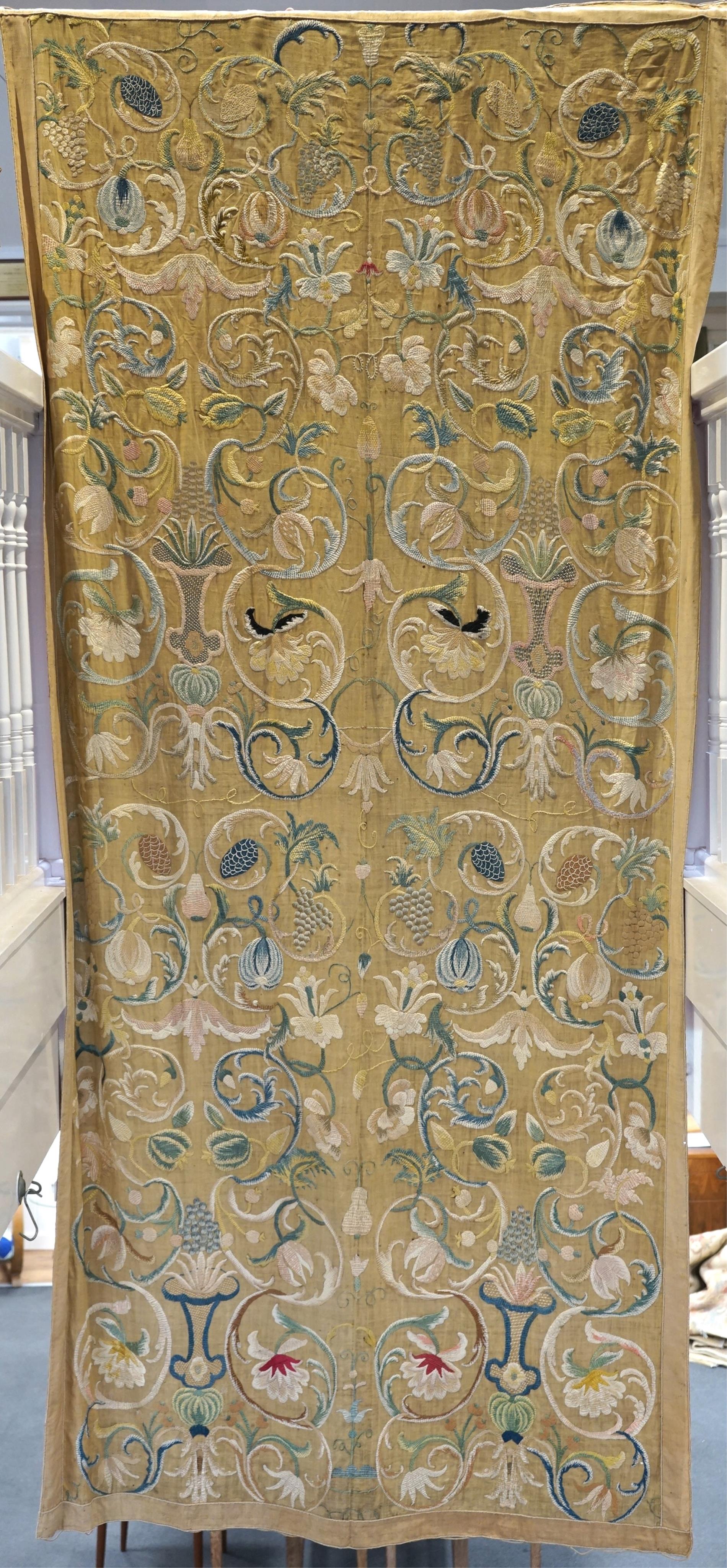 A large pair and one smaller panel of late 18th century Italian silk floss hand embroidered panels, possibly from Florence or Venice, both known for floss embroidery. Thought to be originally sacristy hangings. Elaborate